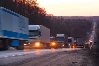 Heavy truck traffic on a country road Heavy truck traffic on a country road